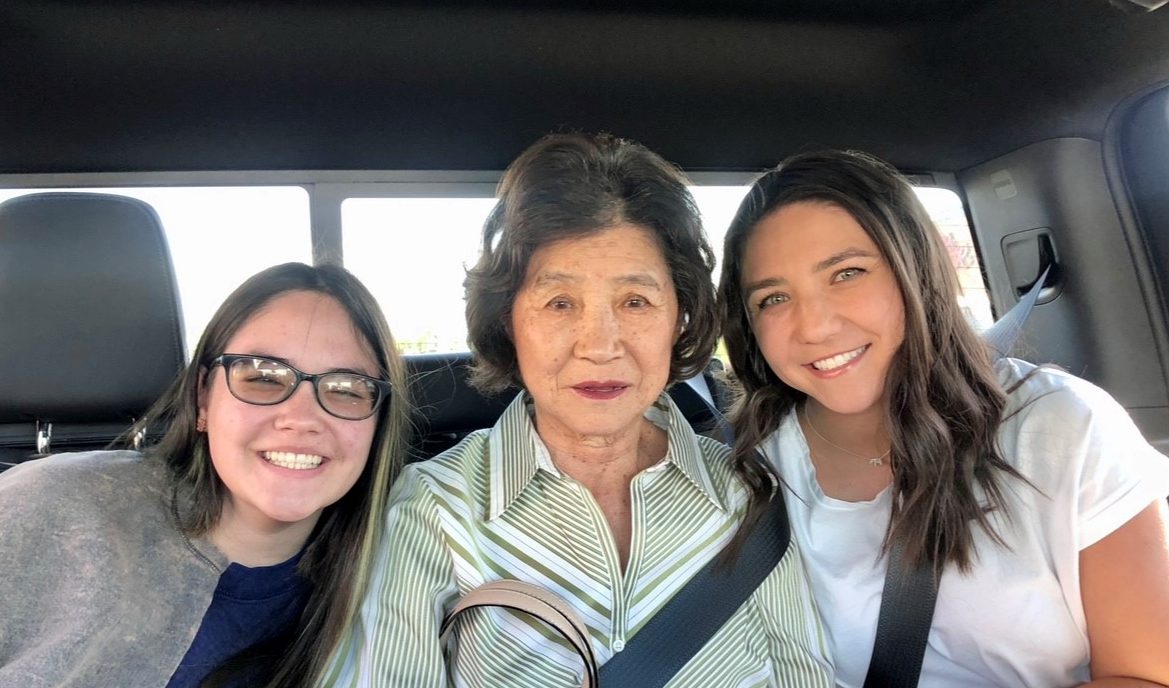 Dukhi Hong pictured with two loved ones