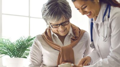 Doctor discussing with a female patient Doctor discussing with a female patient